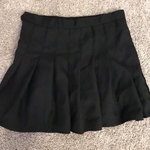 black pleated skirt